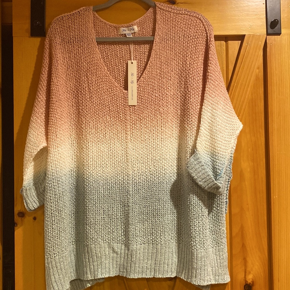 She & sky sweater. One size. New. This sweater is nice for those summer nights.